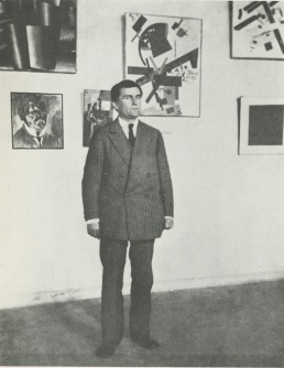 Kazimir Malevich with his paintings in Leningrad 1924.jpg